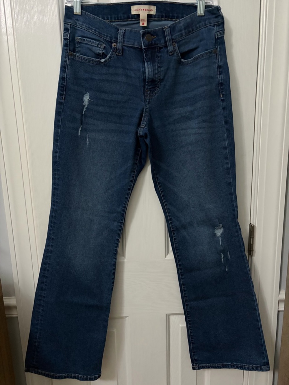 Lucky Brand Dark Blue Flare Jeans with Subtle Distressing
